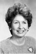 Smiling woman in a black and white photo